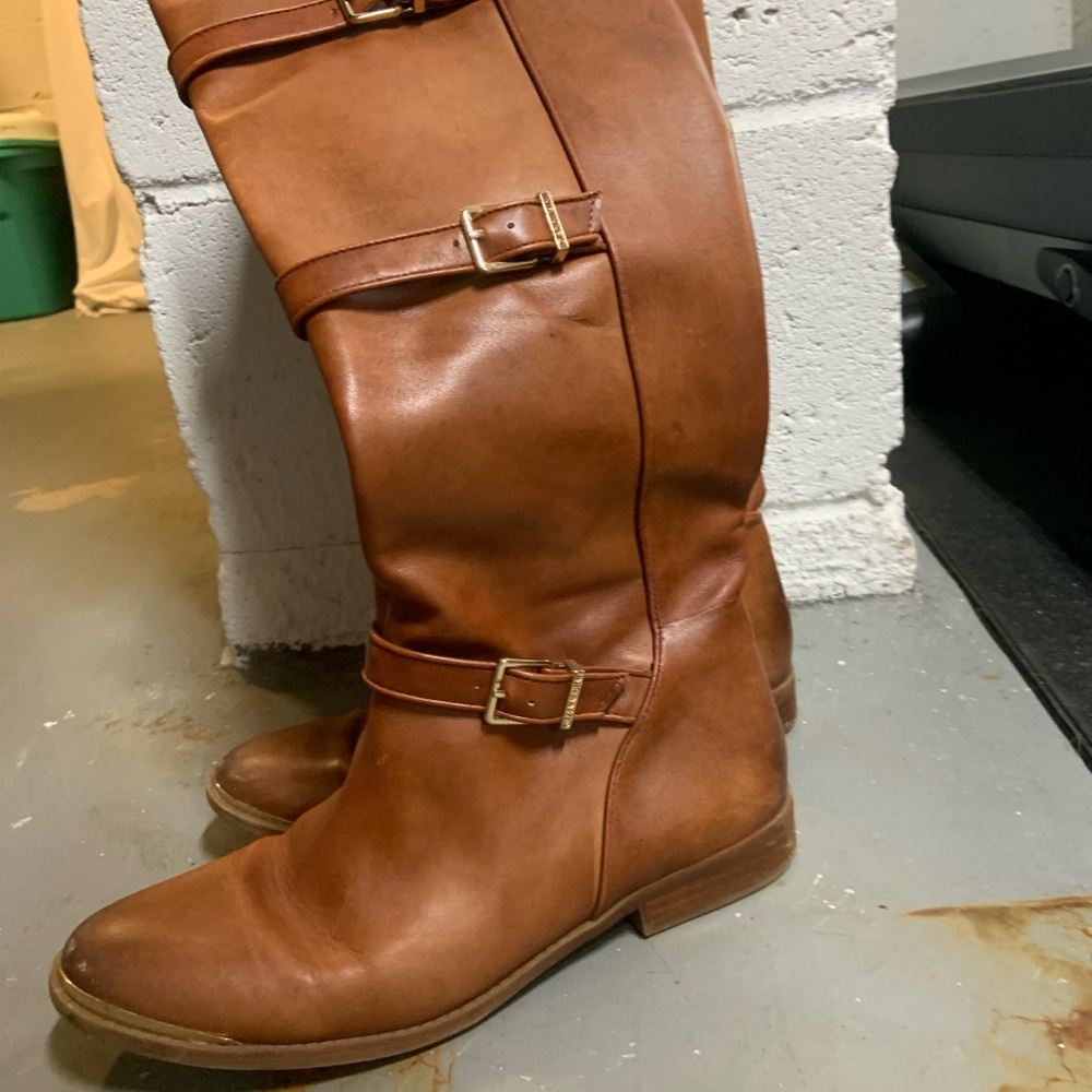 Leather Gianni Bini tall boots, gold buckle and toe detail